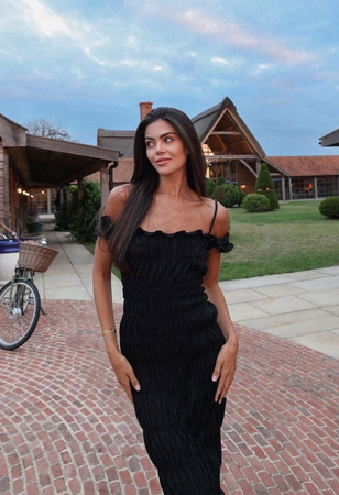 Emily Canham wears the Indra Dress in Black whilst staying at The Wilderness Reserve