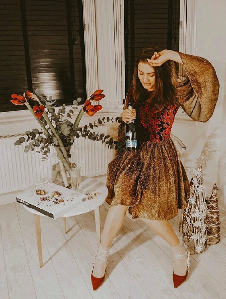 Tania Hergenhahn wears her AW18 Scarlet Mini Dress in Gold