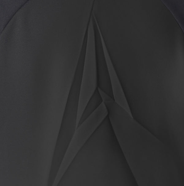 Close-up of a black fabric with folds