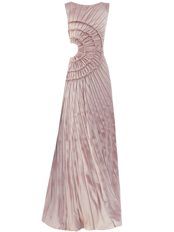 Pink sleeveless velvet floor length dress pleated all over in a striking sunray design with side cut out at waist