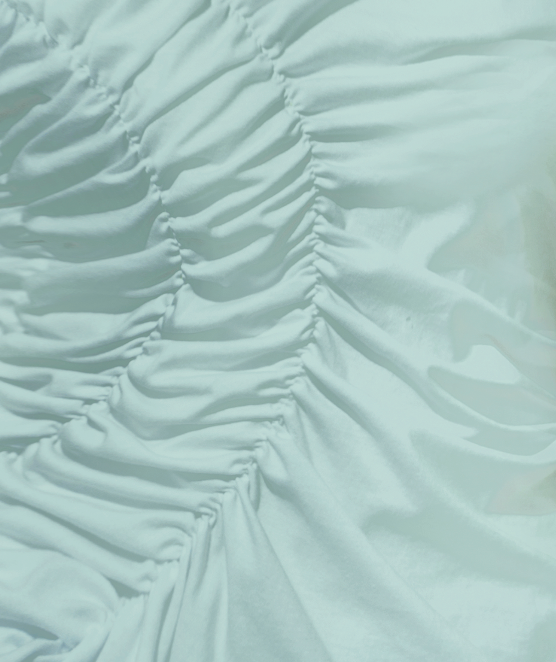 Close-up view of pale blue textured fabric