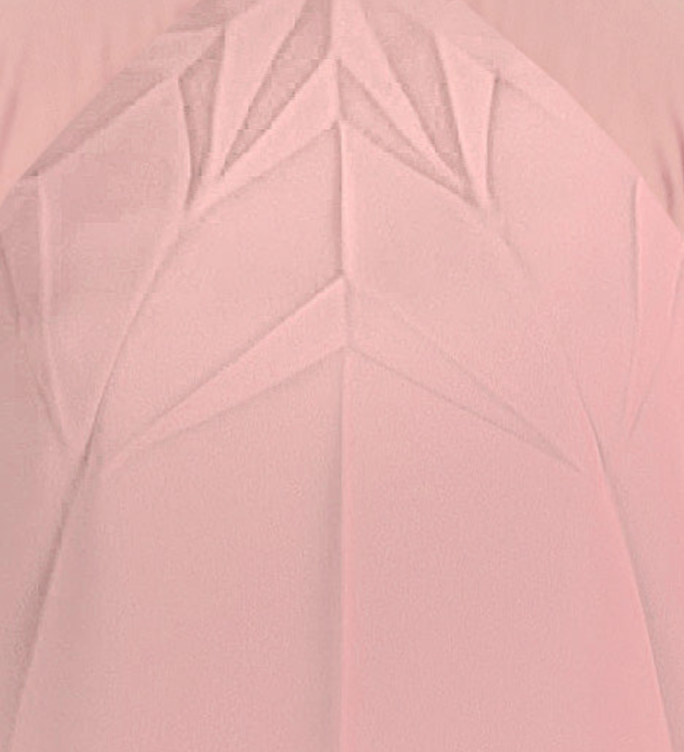 Close-up of a pink textured fabric with geometric patterns