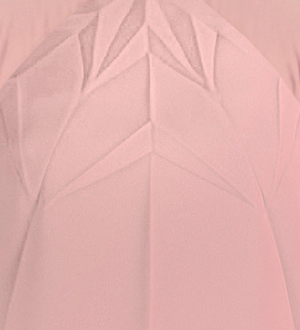 Close-up of a pink textured fabric with geometric patterns