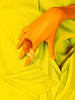 Hand with a snail on a yellow shirt with star design