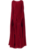 Floor-length merlot dress pleated in a flowing, layered waterfall style with Sunray pleats, featuring wide, floor-length sleeves and a high neckline.